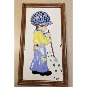 framed 3-dimensional ceramic figurine of a young boy vintage 1999
